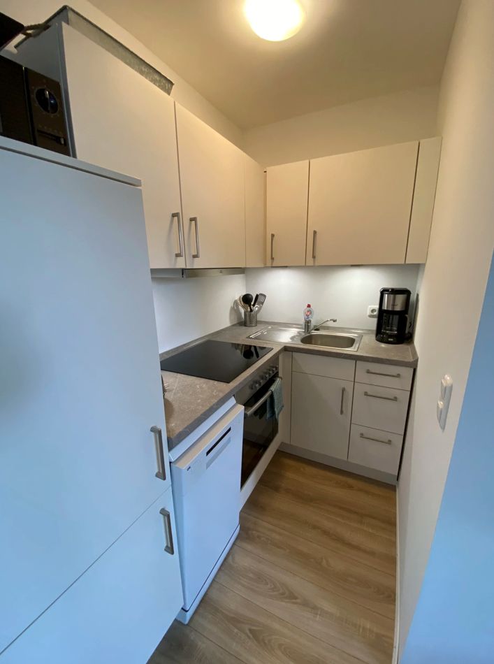 Modern top floor apartment in a quiet side street within walking distance to the main train station