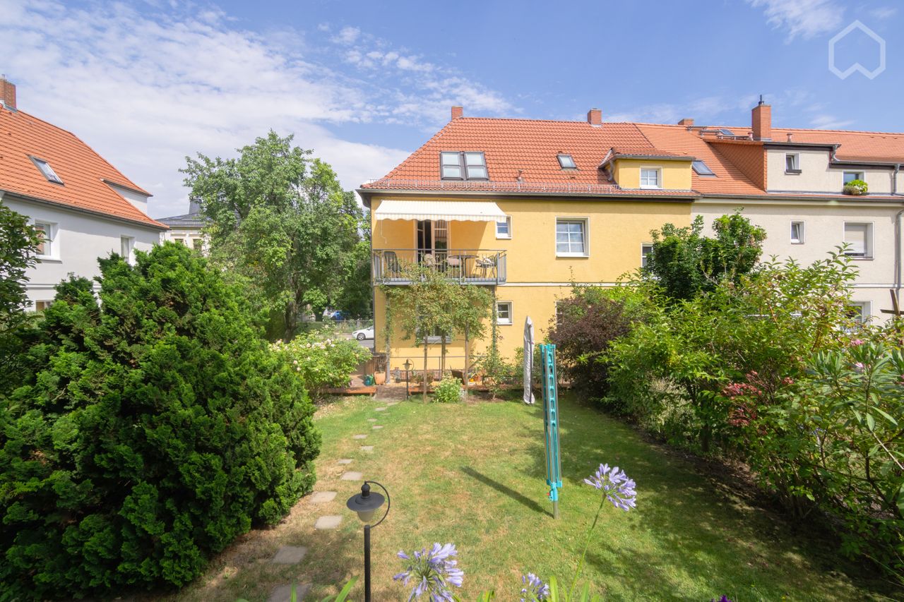 High quality apartment in a two family house with a garden in a quiet, green and central location