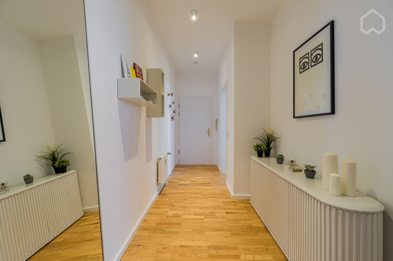 Modern, bright and quiet 2 room business apartment with balcony in a listed old building in green Pankow