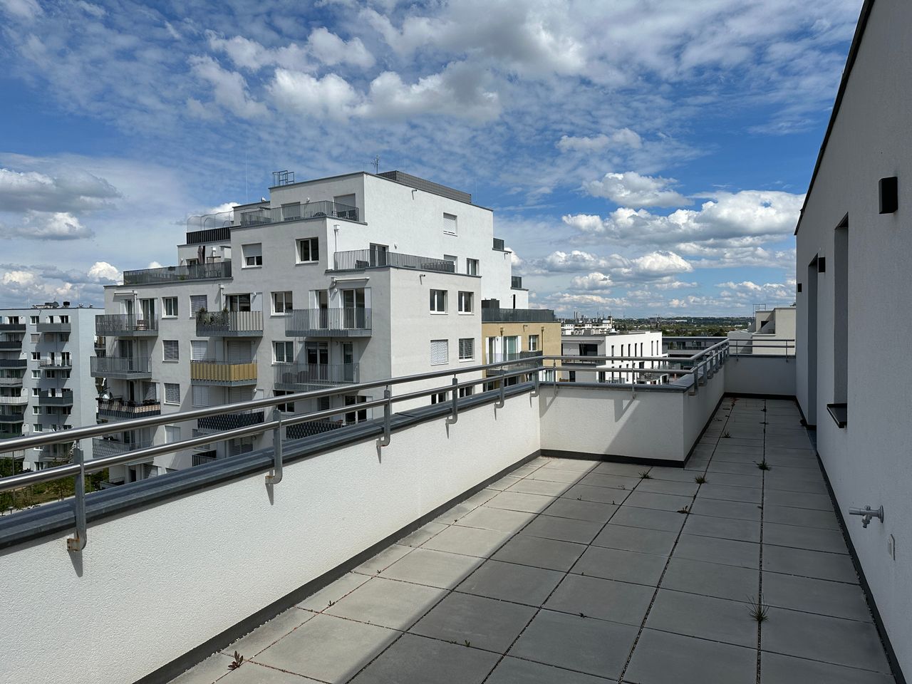 Sunlit Penthouse with Spacious Balcony and Private Garage