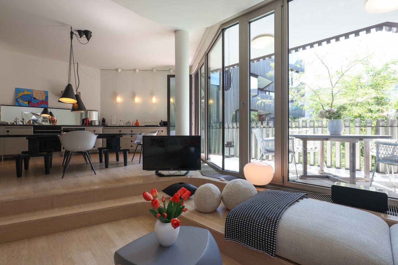 Stylish loft in a designer architectural house in Mitte with a terrace and underground parking space