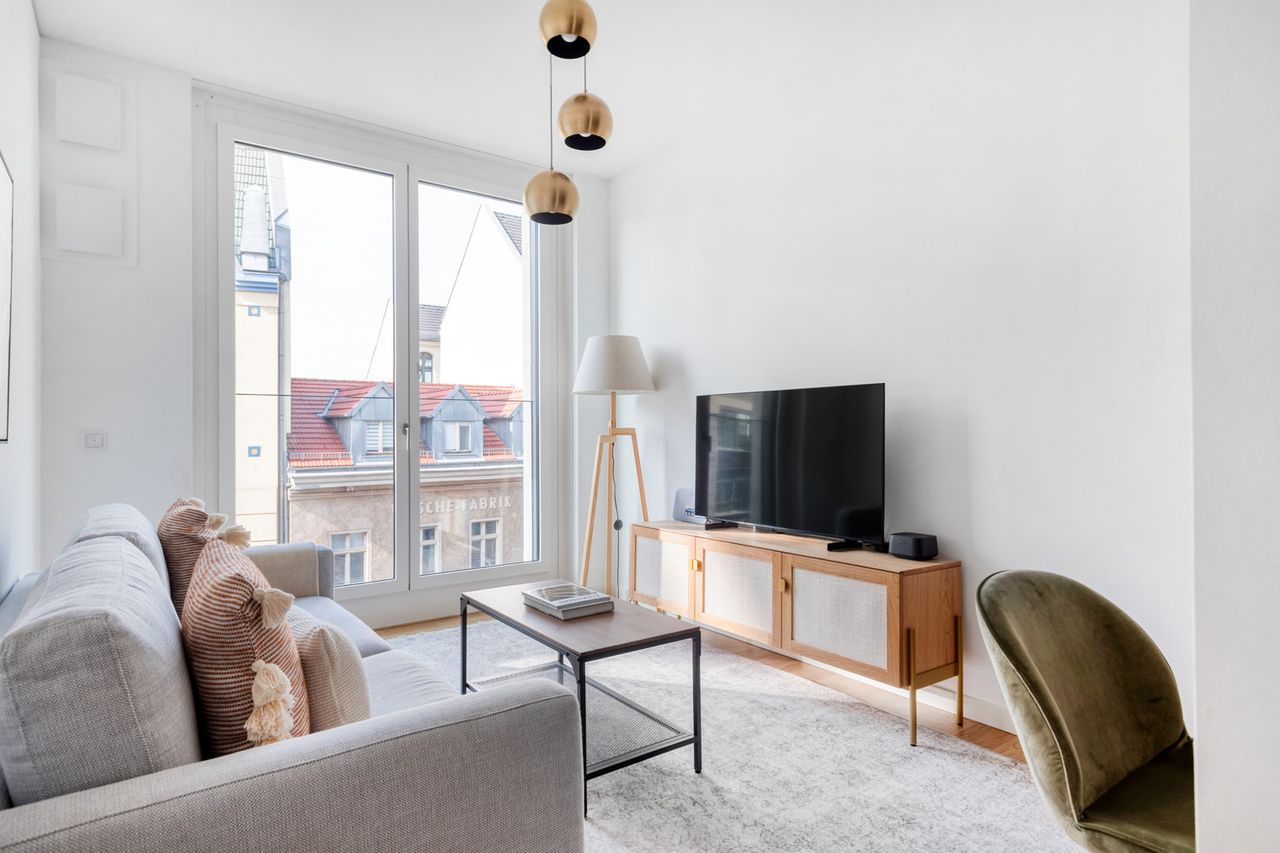 Upscale Mitte 1BR with Apple Store in building