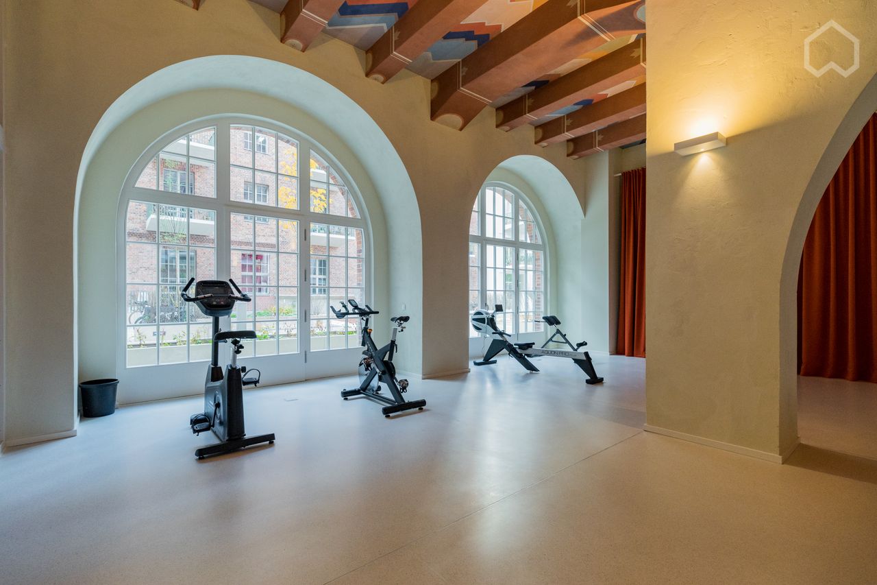 Exclusive designer apartment near KaDeWe in a spectacular 1920s building with gym and concierge service