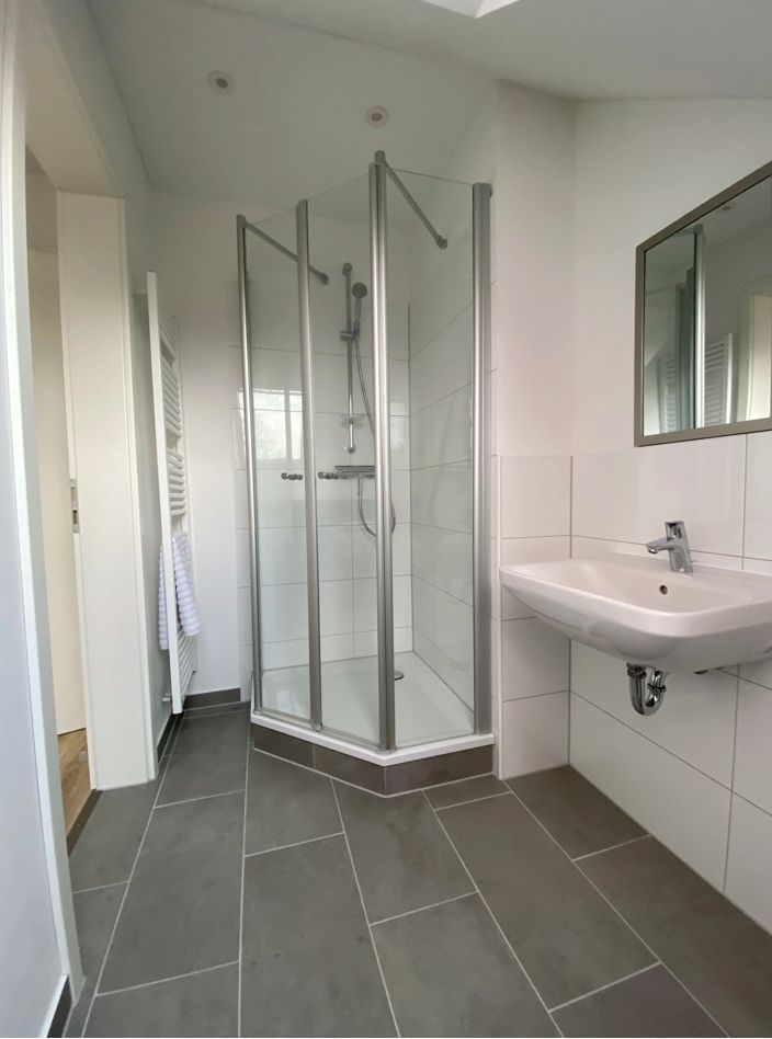 Modern top floor apartment in a quiet side street within walking distance to the main train station