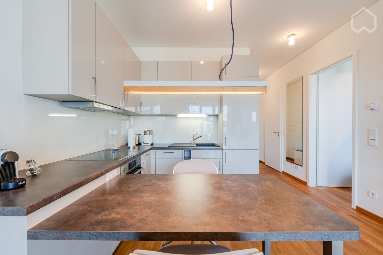 High quality flat with two balconies and underground car park in a new building in the historically grown Richardkiez neighbourhood