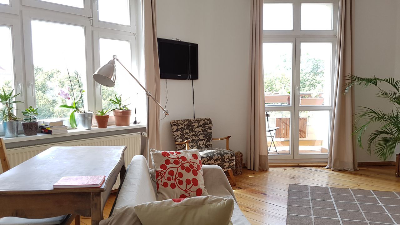 Spacious Corner Apartment Overlooking Boxhagener Platz with 2 Bedrooms and Eat-In Kitchen