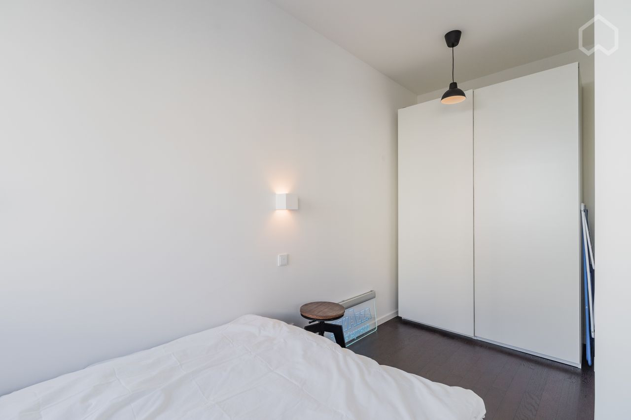 Central design apartment directly at the Spree with Rooftop access