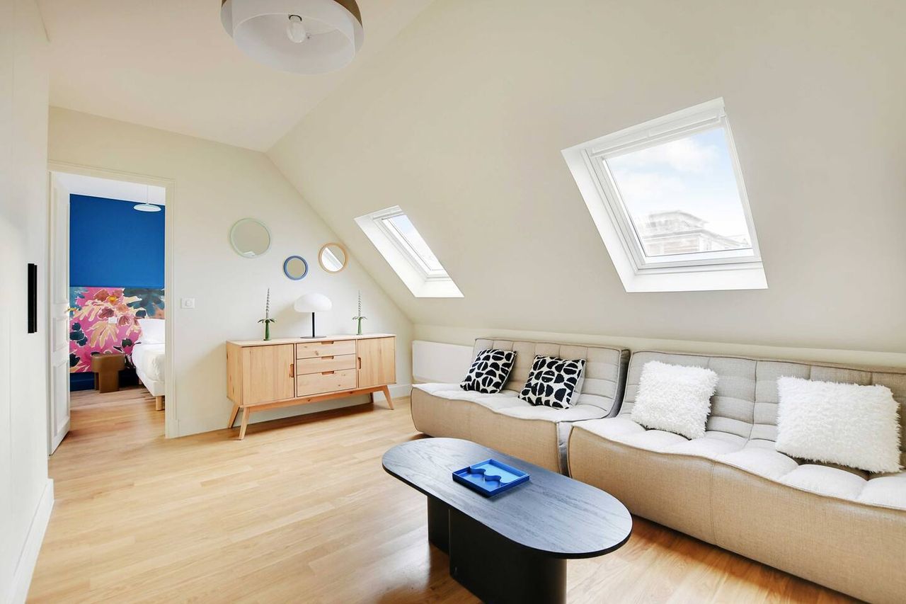 49 m2 flat with views over the roofs of Paris, located in the 6th arrondissement.