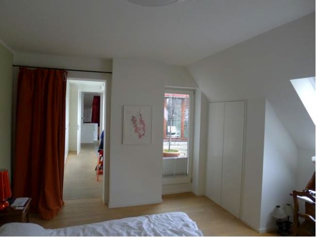 Light-flooded attic apartment in Ludwigkirch-Kiez near Ku'damm with a large terrace and fireplace
