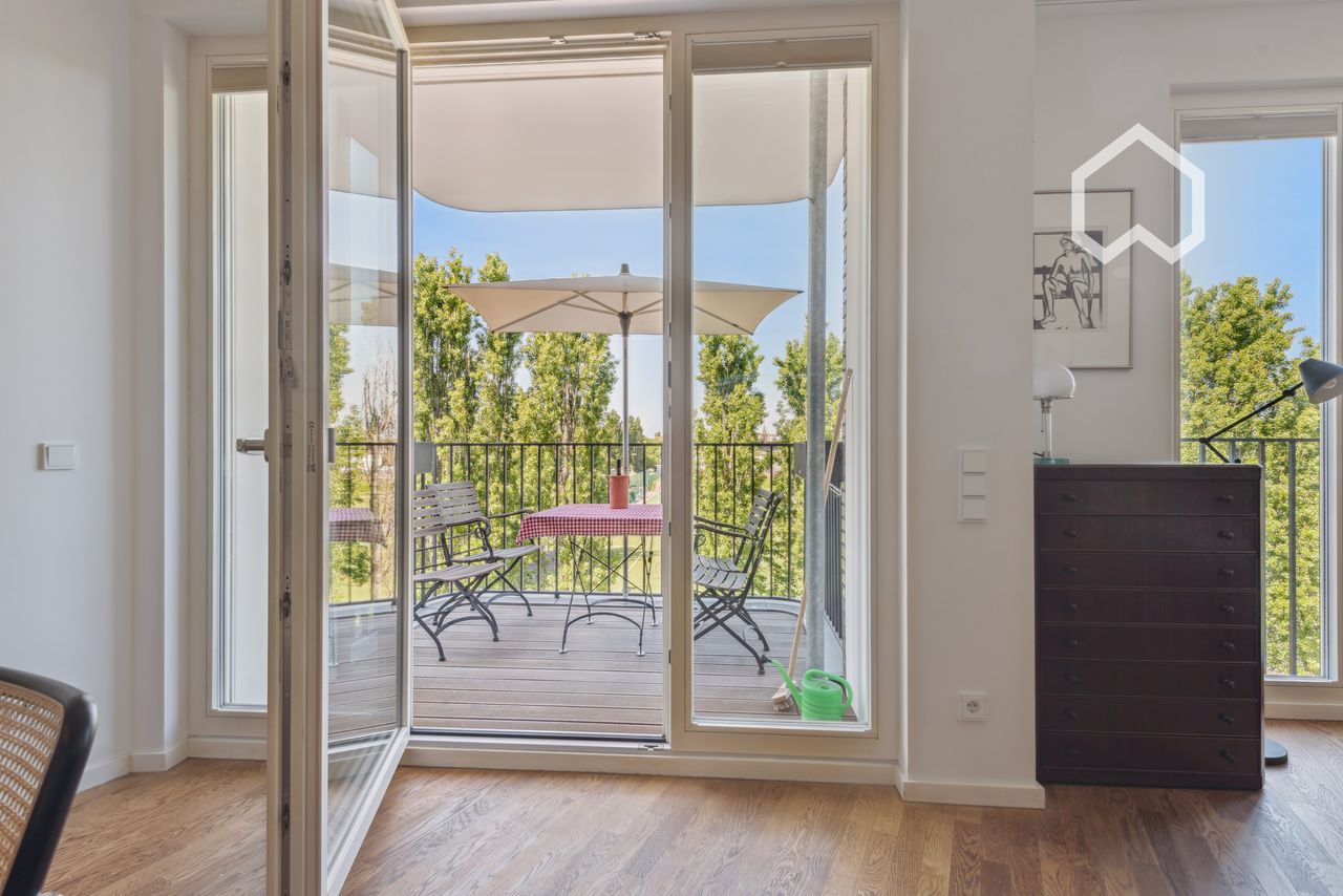 Exclusive, Fully Furnished Designer Apartment with Balcony in Prime Location