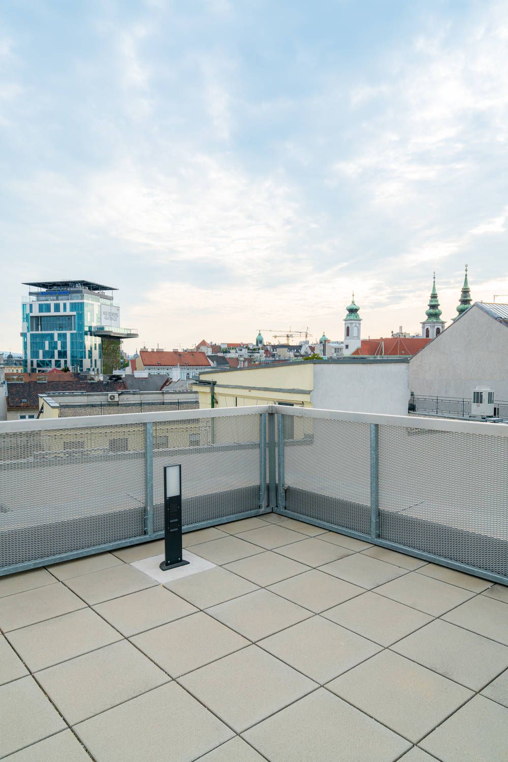 Modern business apartment with air conditioning and private garden in the middle of the city