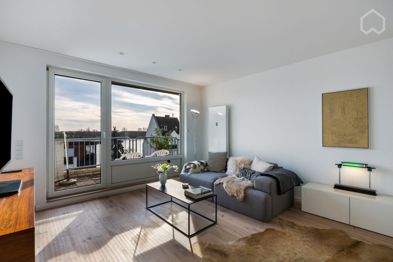 Penthouse apartment with view of the Rhine in the south of Cologne, with excellent transport links