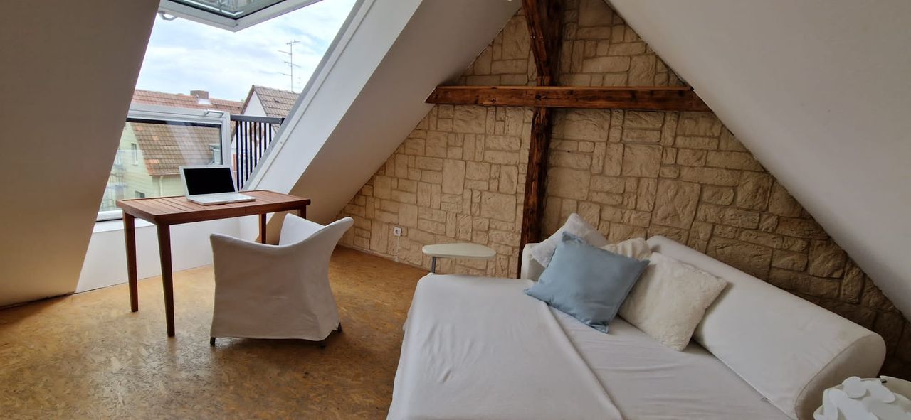 Atmospheric exclusive attic maisonette with skyline view in Nordend Bornheim