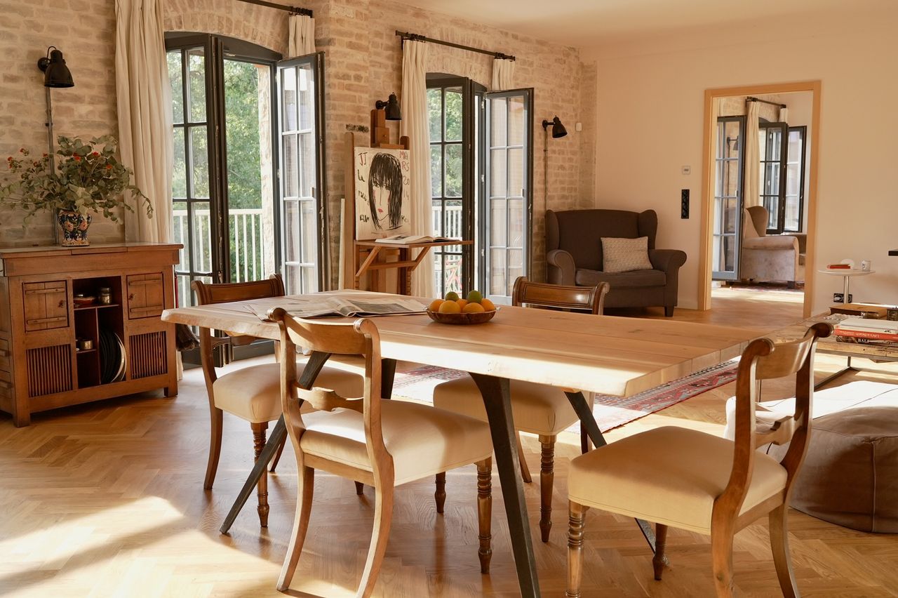 Bright loft in historic factory with oak floors and exposed brick walls