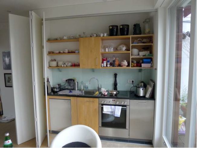 Light-flooded attic apartment in Ludwigkirch-Kiez near Ku'damm with a large terrace and fireplace