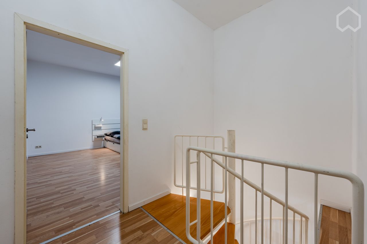 Newly Renovated Two-Level Apartment in Prime Location