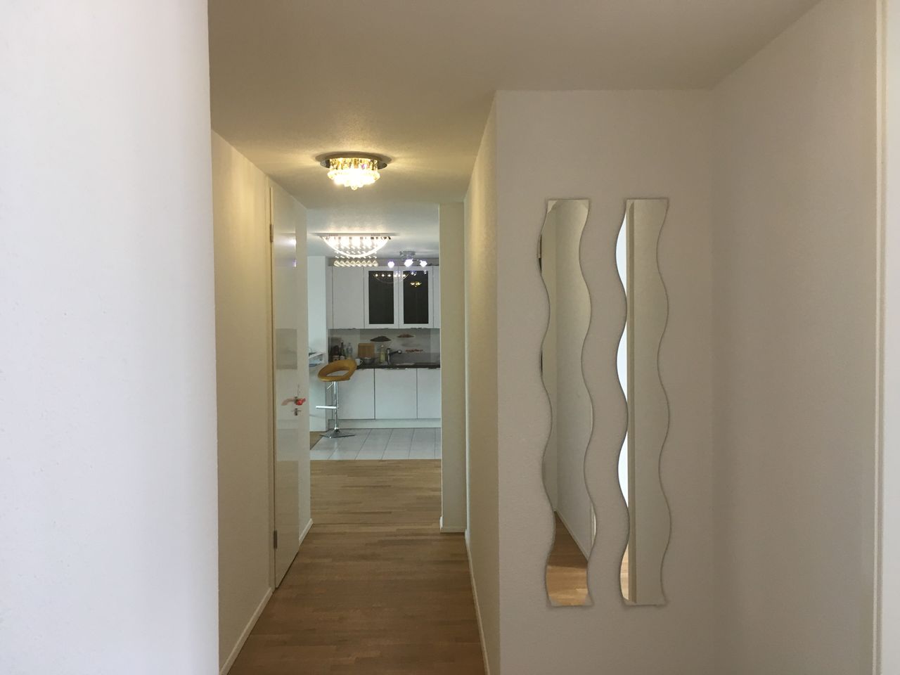Luxury Furnished 3-Bedroom apartment with guest bathroom and large loggia with Taunus and park views in Frankfurt.