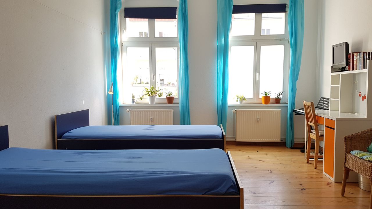 Spacious Corner Apartment Overlooking Boxhagener Platz with 2 Bedrooms and Eat-In Kitchen