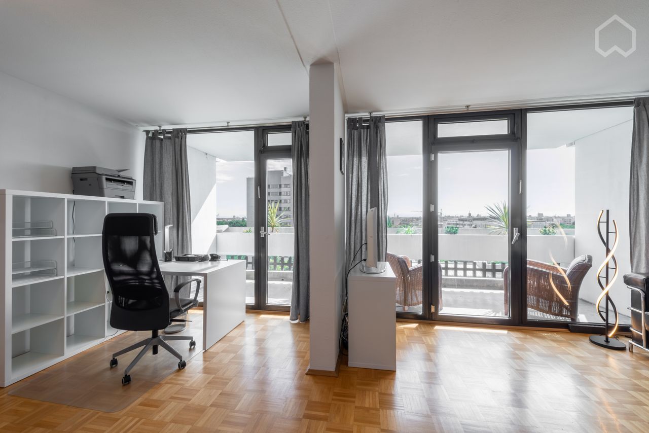 Extremely bright, attractive 2 room apartment on the 10th floor south side with view over Munich into the Alps