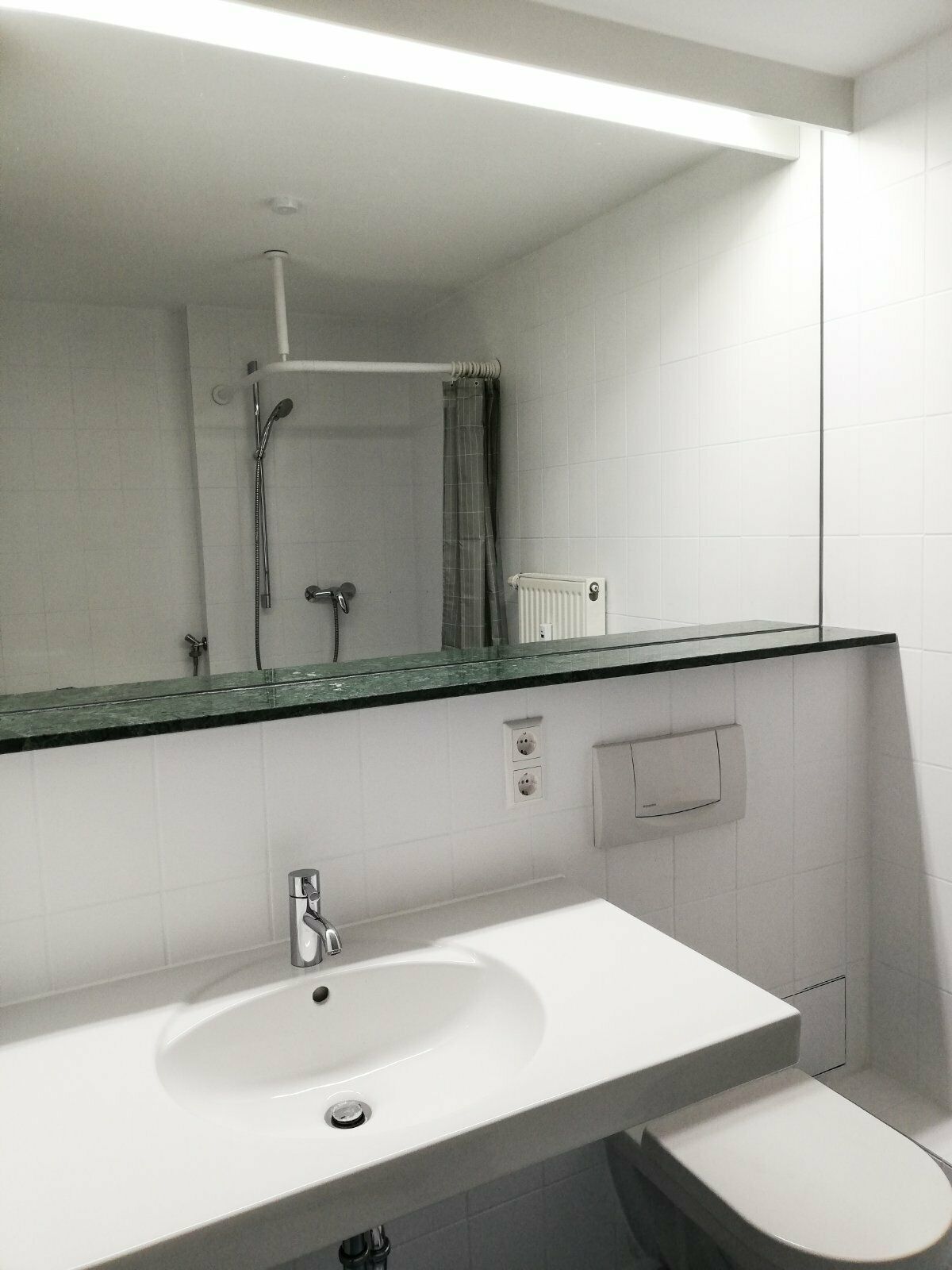 Designer 1-room city apartment, near the train station, newly renovated