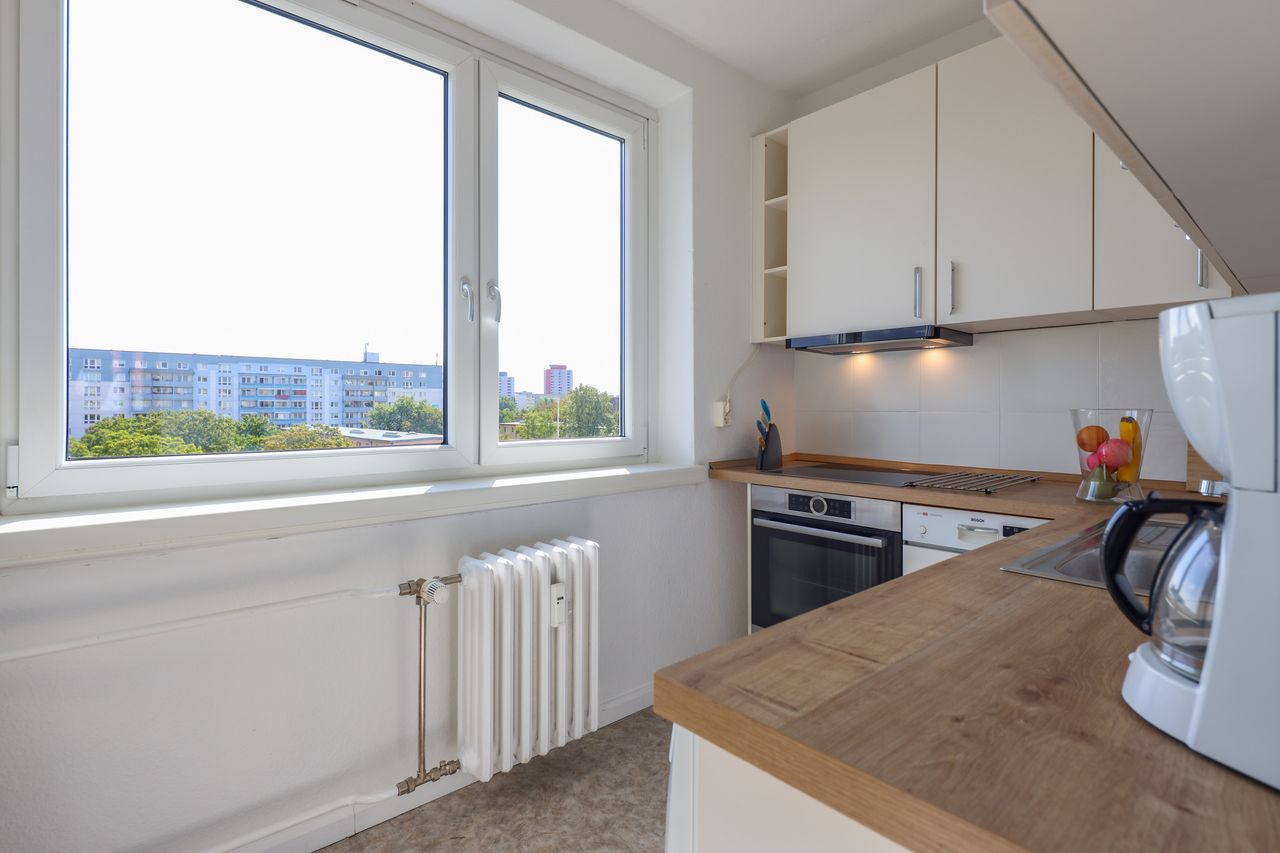 Perfect business apartment with a south-west balcony and a view of the television tower at Alexanderplatz