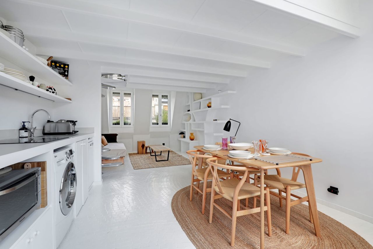Newly refurbished, cosy and atypical flat, quiet and bright with a beautiful French window over the entire height of the room
