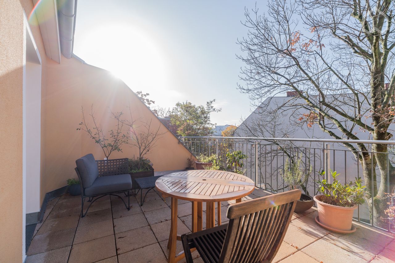 Sunny, quiet attic with terrace in Prenzlauer Berg