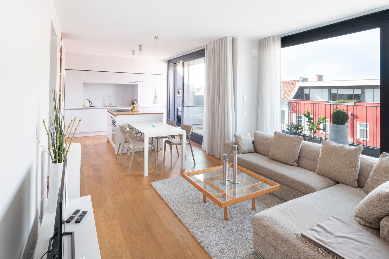 Exclusive penthouse with fireplace and view over the roofs of Berlin.