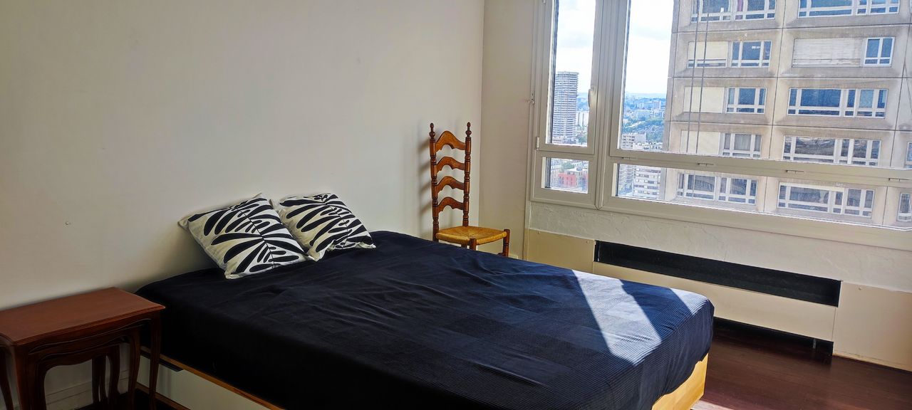 A Room in a Coliving Flat of 70m² with a breathtaking View -Paris 13