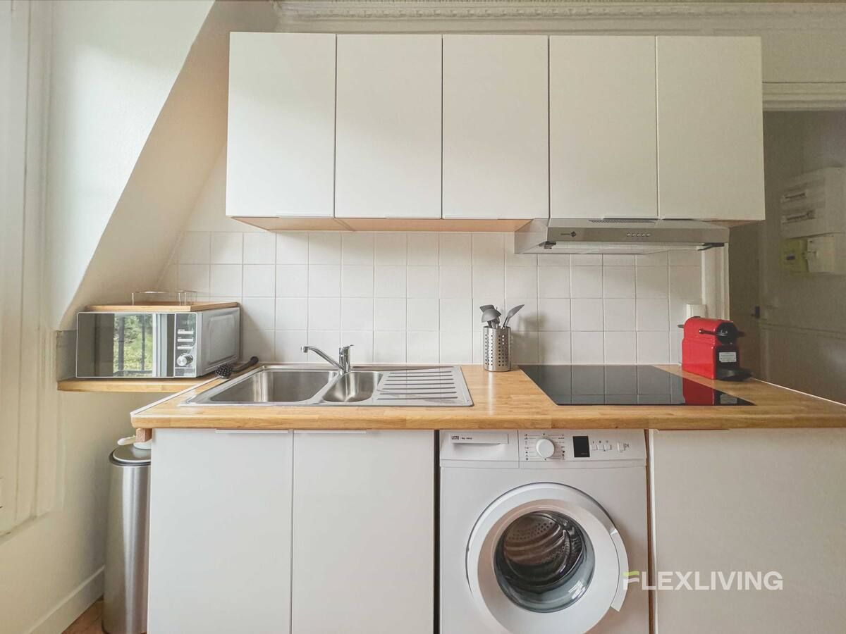 superb one-bedroom apartment located on rue Nodier in the 18th arrondissement of Paris.